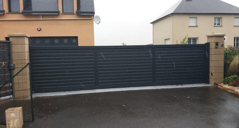 pose portail coulissant galia kostum