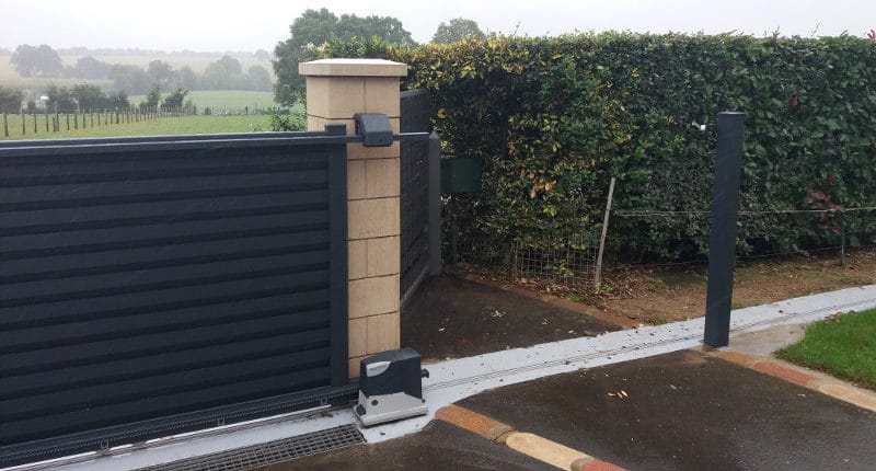 pose portail coulissant motorise kostum